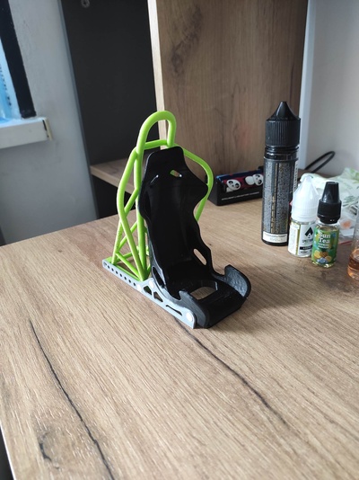 racing seat phone stand roll cage remixed by orangess tools gadgets holder gadget charger charging custom tuning remix stojan telefon rollcage 3d print model - Mito3D