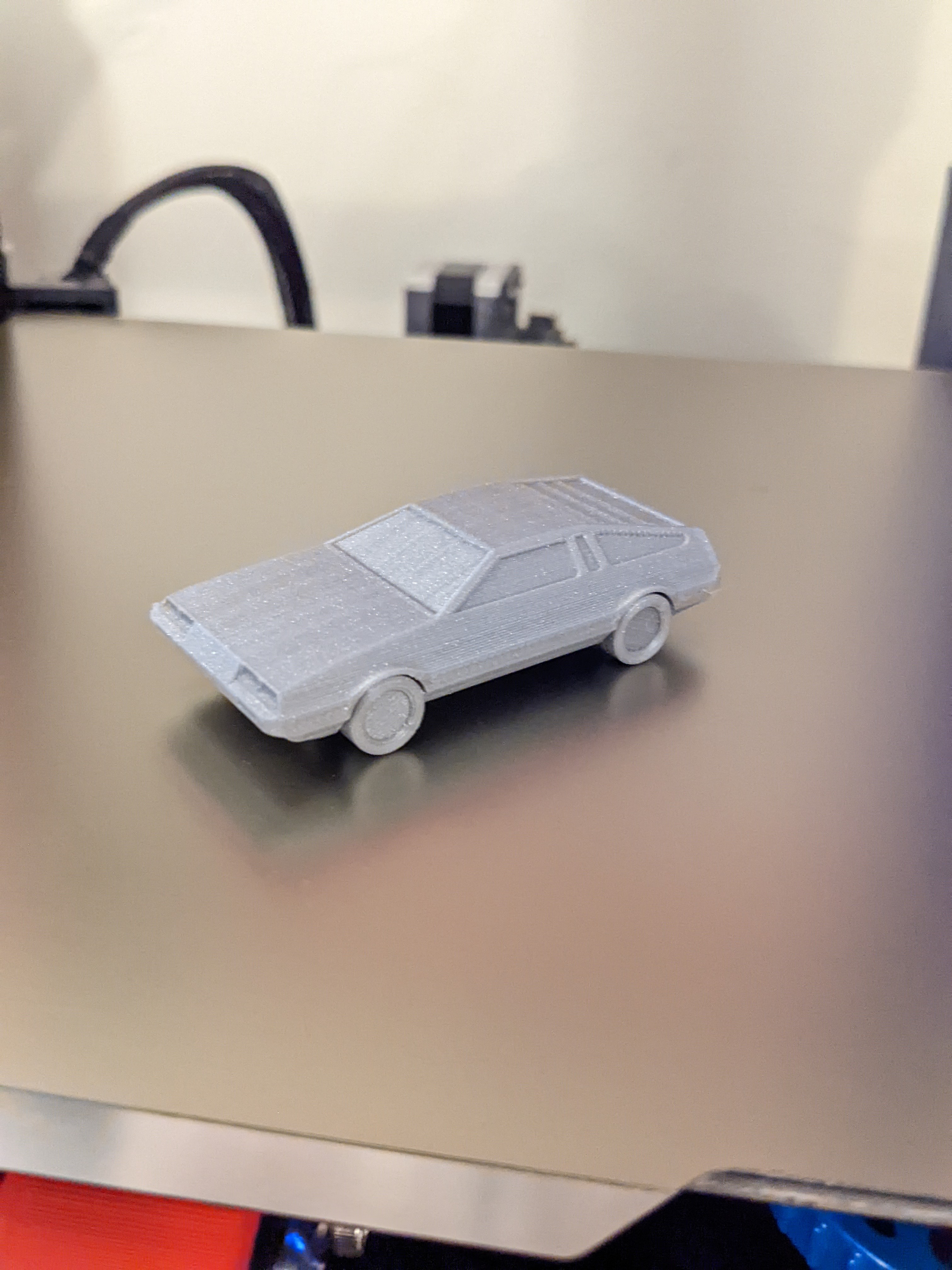 mini dmc delorean print in place by delphant jouets jeux jouet petit 3dprinting voiture modèle printinplace bttf voyage temps véhicule retour futur roues chaudes petite roue voitures imprimer 3D print model - Mito3D