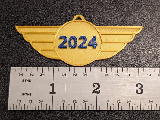 fast 11 min - 2024 badge flying year by m of wi art models newyear newyear2024 newyearseve celebration year's eve years keychain fun party 3d print model - Mito3D