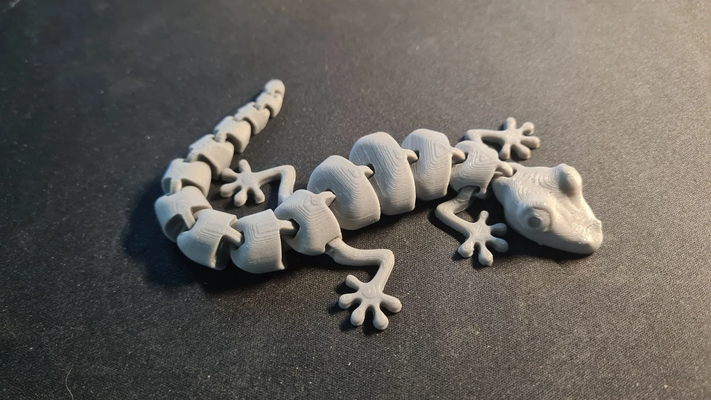 articulated lizard gecko ams or single color print in place remixed by maker1o1 toys & games characters animal cute flexi xlexy flexible printinplace axolotl toy 3d print model - Mito3D