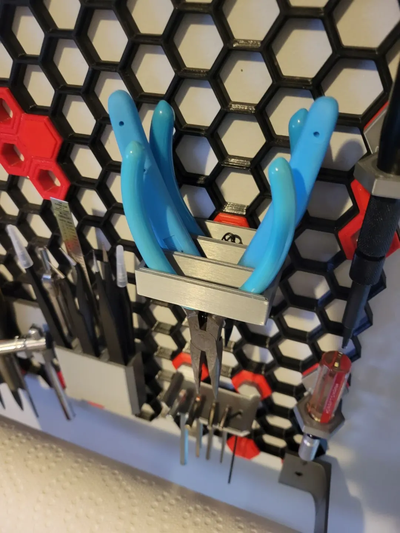 honeycomb wall plier holder remixed by 3d endeavors tools organizers honey comb pliersholder storage pliers plierholder 3d print model - Mito3D