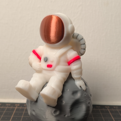 4-colored astronaut sitting on moon remixed by sundaeliu art sculptures 3d print model - Mito3D