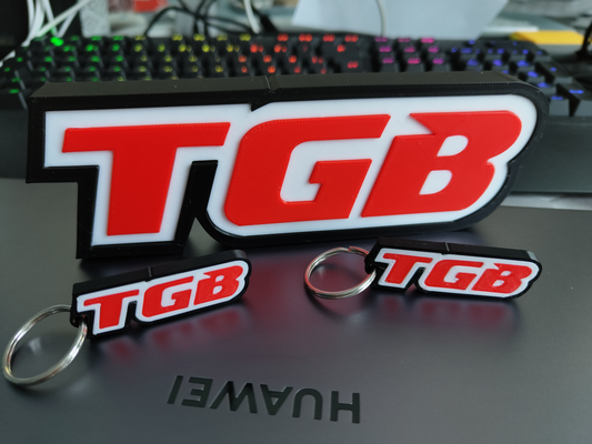 tgb logo by lexs print art panneaux logos clé schluesselanhaenger accueil maison 3d print model - Mito3D