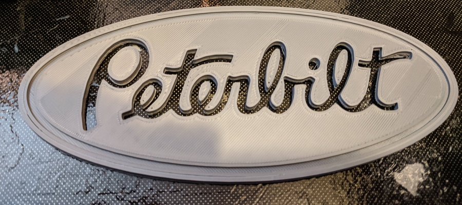 peterbilt logo badge emblème forme d'épingle 3d print model - Mito3D