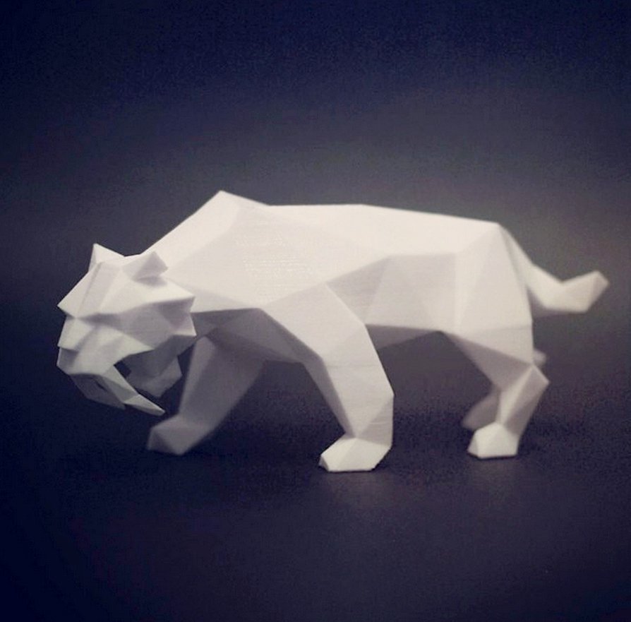 poli tigre dientes sable pinshape facetas estatuilla muebles interior prehistóricos geométricas moderno estatua animal juguete escritorio low poly escultura art depredador extinto extinción cat tiger dentada diente 3D print model - Mito3D