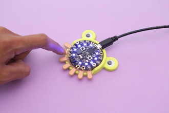 mini synthesizer circuit playground express pinshape fusion-360 goggly-eyes capacitive-touch programming pcb-milling cnc makecode musical instrument diy adafruit 3d print model - Mito3D