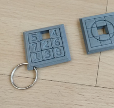 sided sliding puzzle key ring pinshape stuffer stocking sliding-puzzle game fully assembled keyring 3d print model - Mito3D