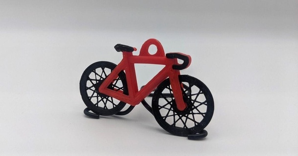 spinning wheel bike keychain mucuslaser download free stl model printablescom 3d models fashion accessories bicycle biking chain fob 3d print model - Mito3D