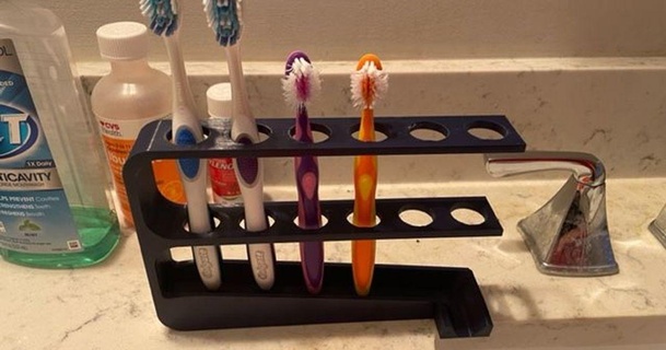 toothbrush holder yo-stuff download free stl model printablescom 3d models household bathroom toothbrusharranger toothbrushholder toothbrushstand 3d print model - Mito3D