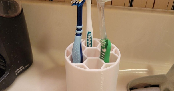 tournant brosse dents titulaire soutien Eric Télécharger libre stl modèle imprimablescom 3d modèles Ménage salle bains filage 3d print model - Mito3D