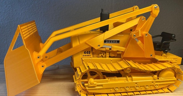 Juan deere 440 tractor frente final cargador mecanismo skidder 3D modelos juguetes juegos vehiculos 3d print model - Mito3D