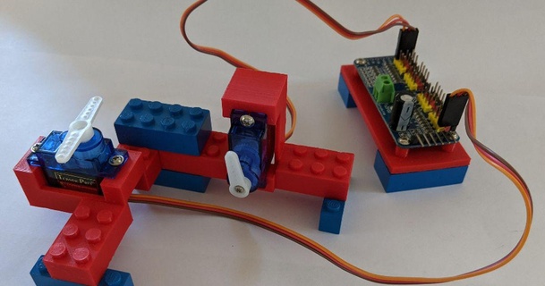servo motor pwm controlador Lego conectores geoff uk baixar livre stl modelo printablescom 3d modelos passatempo fabricantes rc robótica 9gservo criação digital legocompatível Raspberry Pi 3d print model - Mito3D