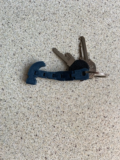 flexi hammer keychain - 3d by theocharisanastopoulos on thangs 3d print model - Mito3D