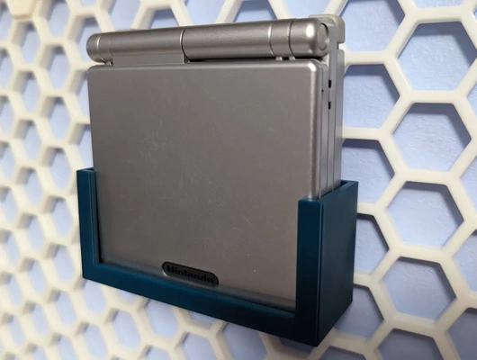 gameboy advance sp holder honeycomb storage wall - 3d by ryanparsley on thangs 3d print model - Mito3D