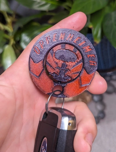 oppenheimer spinning keychain - 3d by rwbdesigns on thangs movie nuc nuclear printinplace print-in-place fidget rwb designs spinner 3d print model - Mito3D