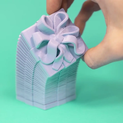 springo gift box single color version - 3d by on thangs container boxes holder slinky spring no supports support free coil helix wrap wrapped ribbon christmas birthday holiday 3d print model - Mito3D