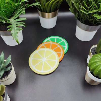 stackable magnetic slice coasters - 3d by bamingodesign on thangs home & garden kitchen dining coaster coasterset drinkscoaster drinkcoaster drinkcoasters drinkcoasterset orange lemon yellow lime green magnet 6x2 3d print model - Mito3D