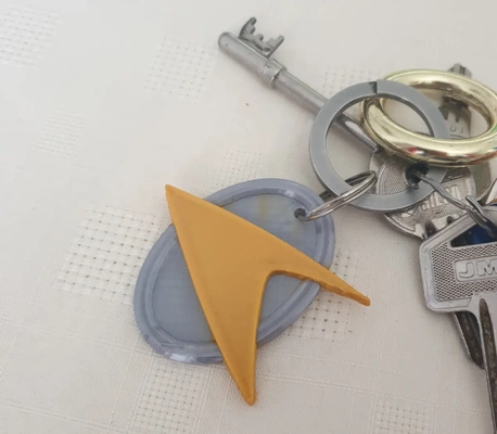 two colour starfleet combadge key ring split up dual prints easy & quick - 3d by oddity on thangs 3d print model - Mito3D