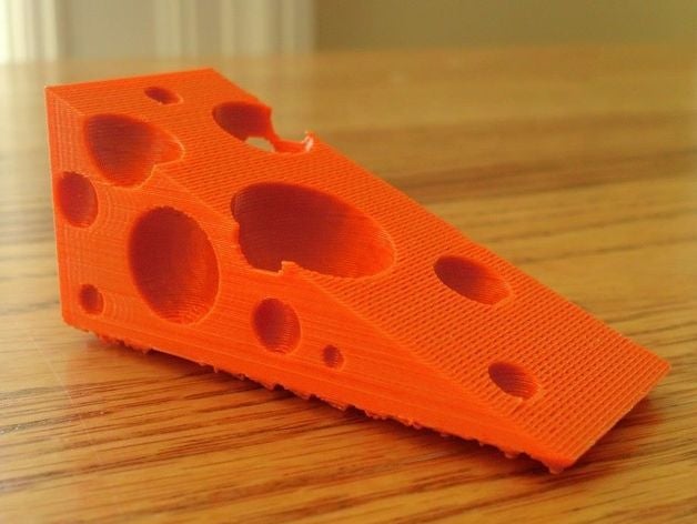 swiss cheese doorstop household wedge 3D print model - Mito3D