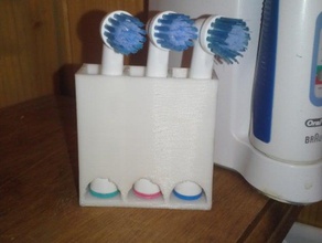 see colored ring tooth brush holder bathroom oral b toothbrush head stand 3d print model - Mito3D