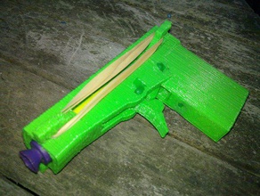 foam dart pistol mechanical toys band gun nerf rubber 3d openscad parametric toy 3d print model - Mito3D