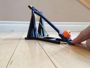 katapult speelgoed spelletjes 3d geprinte bureau elastisch halloween launcher penny pompoen 3d print model - Mito3D