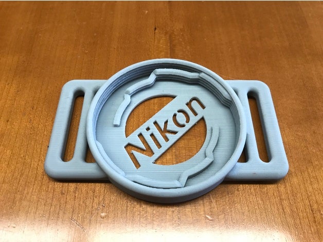 nikon lens cap holder 52-58-67-72-77 la fotocamera lenscap 3D print model - Mito3D