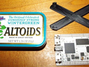 standoff bracket holding mini spartan 6 fpga board altoids tin electronics 3d print model - Mito3D