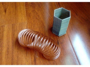 toy spring toys & games helix library openscad slinky spiral 3d print model - Mito3D