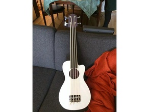 printable ukulele bass music guitar bridge electric fishmann fusion 360 instrument kala musical nut portable presys saddle simplify3d thundergut travel ubass 3d print model - Mito3D