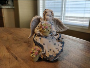 anjo segurando flores scans e réplicas a decoração jardim ornamento 3d print model - Mito3D
