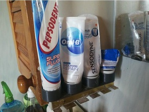 toothpaste rack holder bathroom accessories hook organization organizer tube wall mount 3d print model - Mito3D