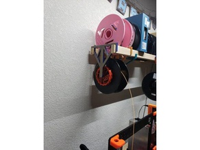 auto-rewind spool holder hanger 1x2 wood shelves 3d printing nerd printer accessories 3d print model - Mito3D