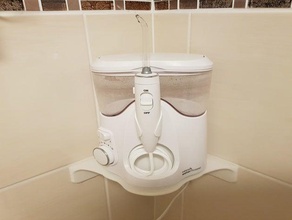 corner shelf waterpik water flosser bathroom 3d print model - Mito3D