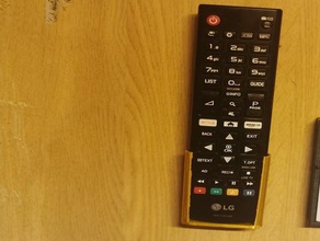montaje de pared lg tv remote control fernbedienung halterung el televisor remoto en la wandhalterung 3d print model - Mito3D