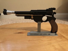 mandaloriane blaster stand baby yoda cacciatore di taglie disney jedi mando starwars 3d print model - Mito3D