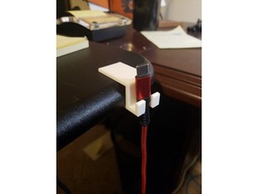teléfono soporte cable gestión cables iphone alimentación 3d print model - Mito3D