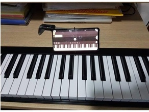 alesis v49 clip on smartphone soporte acortar teclado midi teléfono piano estante 3d print model - Mito3D