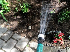 spraying garden hose head garden garden hose hose nozzle spray sprayer watering
