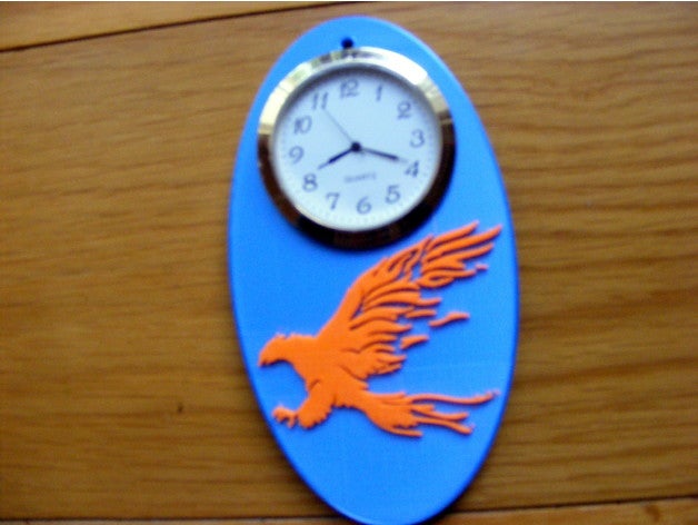 llameante águila reloj 3D print model - Mito3D
