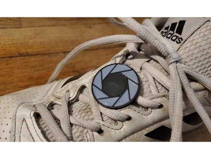aperture science shoelace badge unitedpixel 3d print model - Mito3D