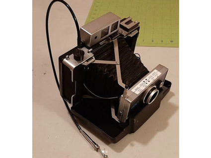 Polaroid kablo serbest bırakmak adaptör jamesskelton 3d print model - Mito3D