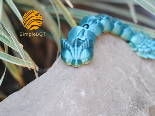 mafsallı bebek ejderha by basitbqt evrim kıpır esnek baskı yeri oyuncak 3d print model - Mito3D