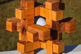 in gabbia con la palla da golf di puzzle i giocattoli brain teaser 3d print model - Mito3D
