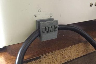 um2 cordon d'alimentation support maker diy de la puissance le clip pièce jointe retenue 3d print model - Mito3D